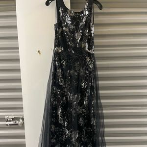 Long wedding guest dress. Black tulle top layer